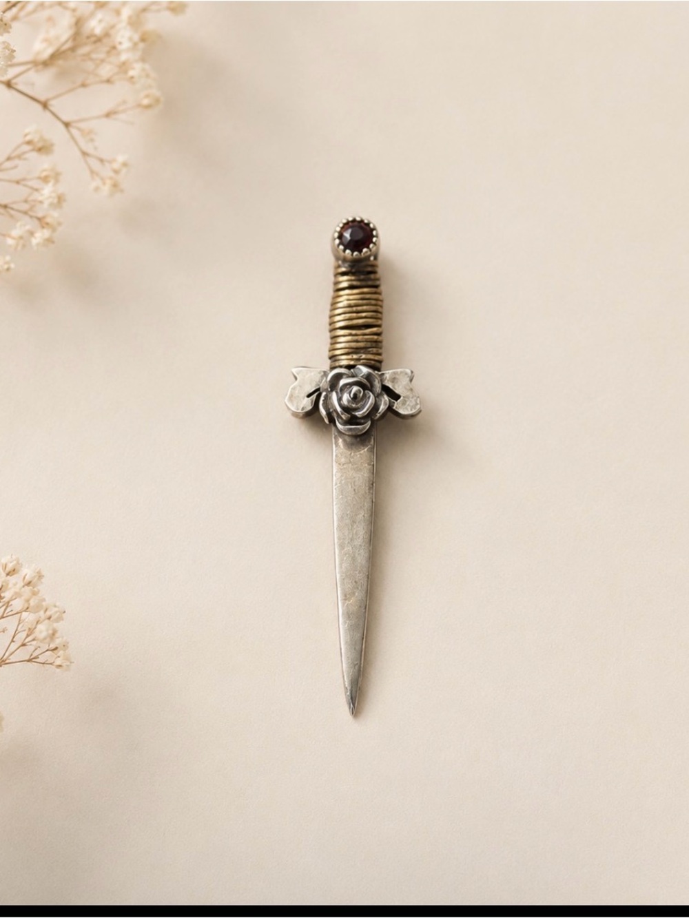 Sterling Silver Rose Dagger Pendant with Garnet Accent